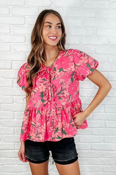 Blusa con mangas abullonadas y estampado floral
