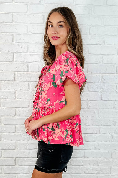 Blusa con mangas abullonadas y estampado floral