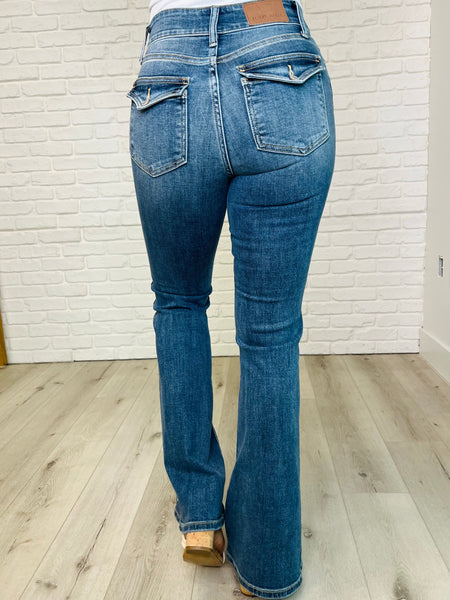 Jeans azules Judy acampanados con cintura doble y tiro alto Ariana