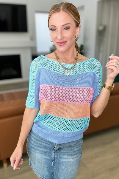 Suéter de rayas de punto suelto de un amigo