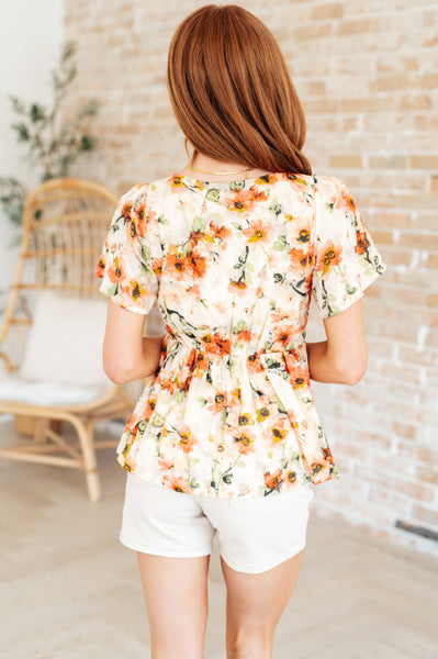Blusa floral con cuello cuadrado de Magic Dance