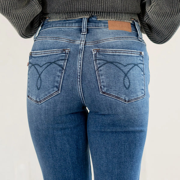82621 Vaqueros azules Judy de tiro medio con corte acampanado térmico Allegra