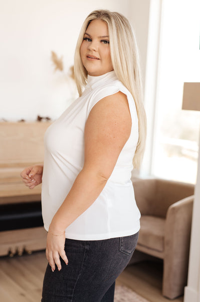 Top de cuello alto y mangas cortas sobrecalificado