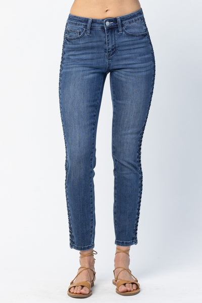 Vaqueros azules Judy trenzados de ajuste relajado, sin desgaste, de talle medio y de Carah