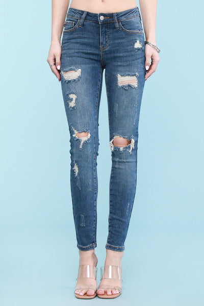 8829 Chelle Pantalones pitillo azules Judy destruidos de talle medio